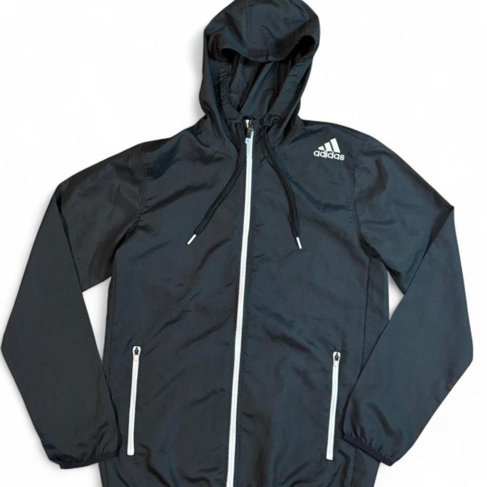 Adidas black windbreaker‎ jacket with hood and zipper pockets. Size S